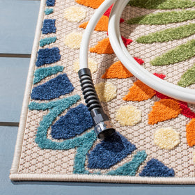 Safavieh easy-clean rug; hose rinse keeps outdoor areas fresh.