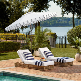 SAFAVIEH outdoor umbrella works with standing or table bases for versatile setups.