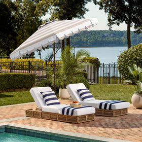 SAFAVIEH Vienna 9ft umbrella adds UV resistance and outdoor comfort.