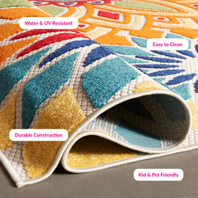 SAFAVIEH rug being hose-rinsed for quick outdoor cleaning