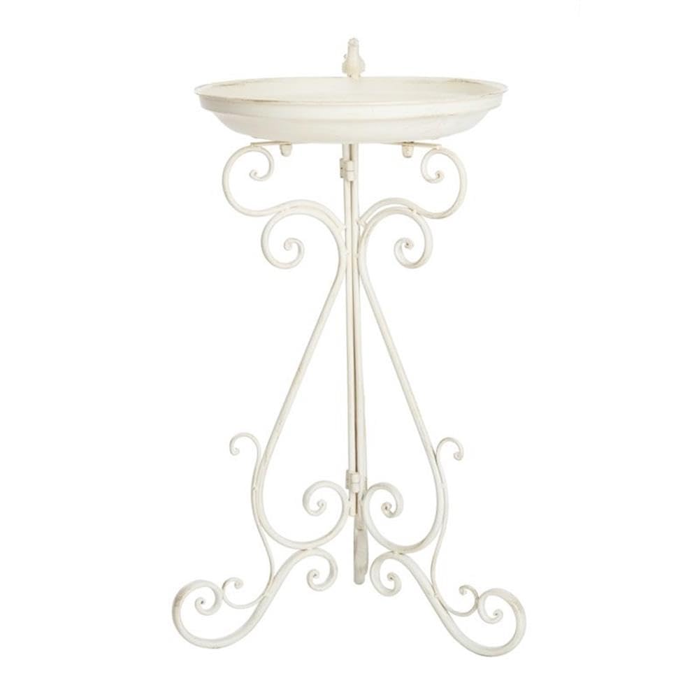 SAFAVIEH sculpted bird accent creates a charming focal point.