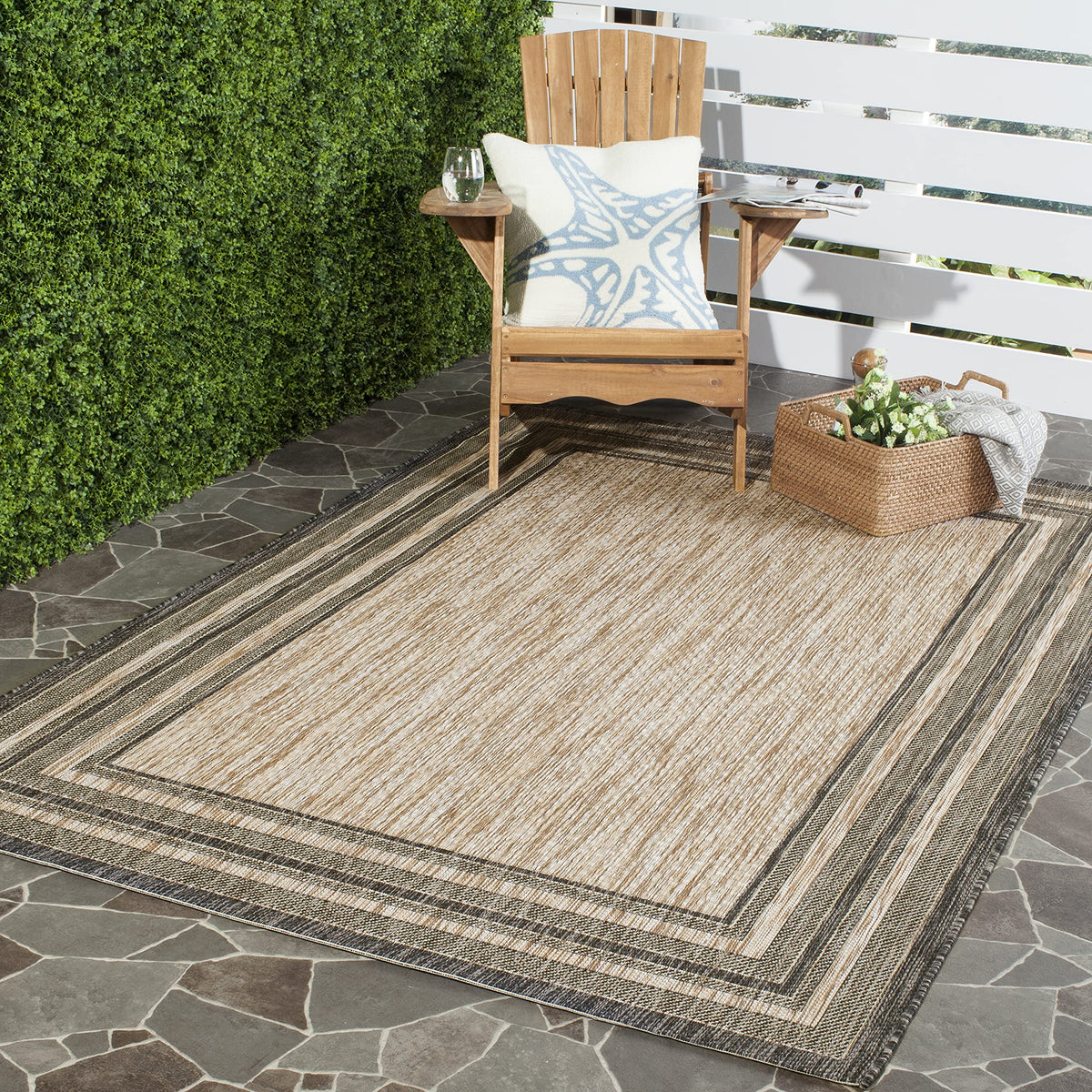 Safavieh Courtyard washable rug natural-black, front view, ideal for outdoor patios.