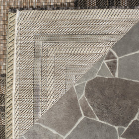 SAFAVIEH washable courtyard outdoor rug 2-3x-4 natural black ideal for patio and entryways.