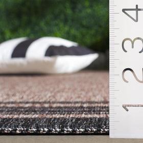 Safavieh Courtyard washable rug natural-black, patio setup for stylish outdoor spaces.