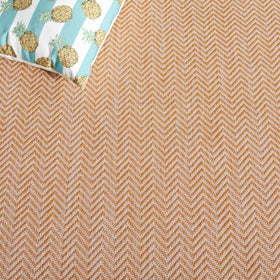 Safavieh weather-resistant rug ideal for sun and rain exposure.
