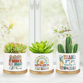 Flower-themed ceramic planters promote vibrant desk decor for teachers