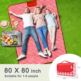 SAMSIER picnic blanket folded compact with a handy carry handle for easy transport.