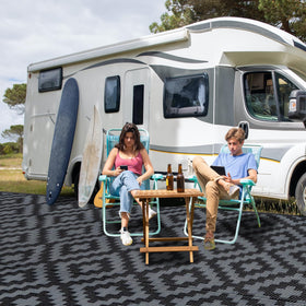 SAND MINE foldable rug with carrying bag for travel and storage.