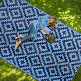 SAND MINE outdoor mat designed for RVs and camping, versatile.