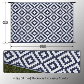 SAND MINE outdoor rug rolled for storage with carrying bag