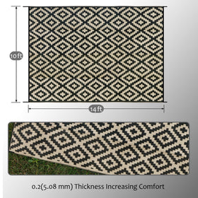 SAND MINE plastic straw rug foldable with carrying bag; ideal for travel.