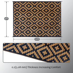 SAND MINE plastic straw rug folded for easy storage with carry bag.