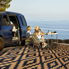 SAND MINE portable easy-clean rug ready for camping with bag included.