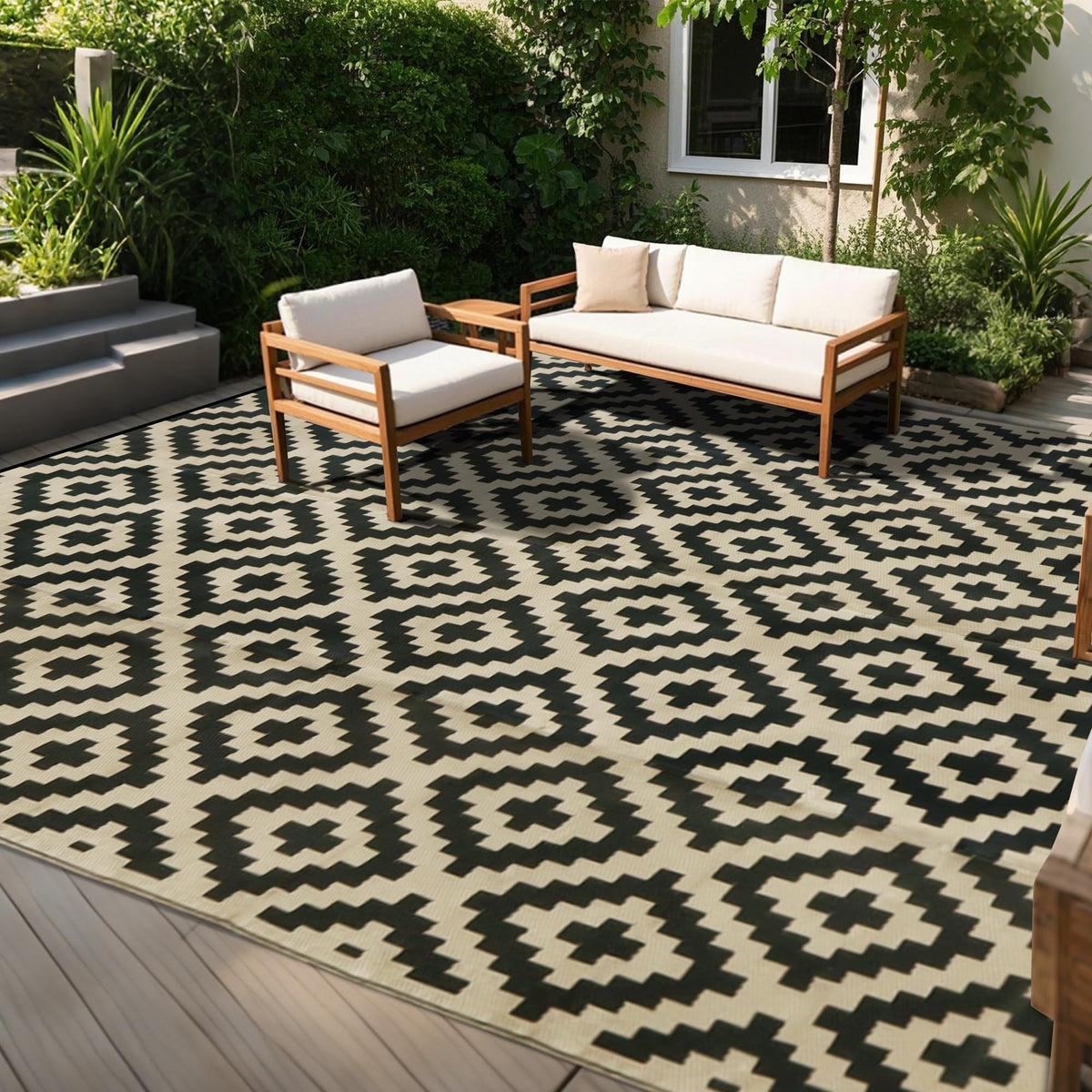 SAND MINE reversible mats black-beige outdoor rug; durable and easy to clean.