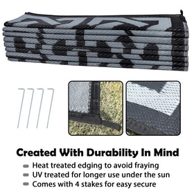 SAND MINE mats with corner loops and stakes for secure setup.