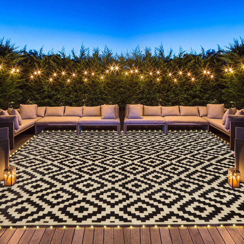 SAND MINE reversible mats with LED strip for patios, creating warm patio ambience after sunset