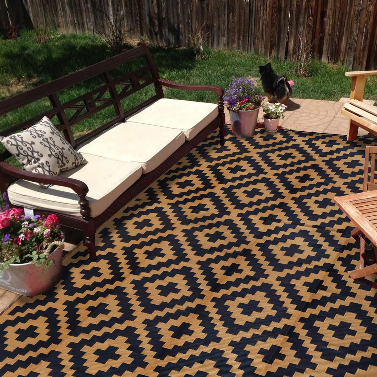 SAND MINE reversible mats outdoor rug on patio for stylish entertaining and easy care.