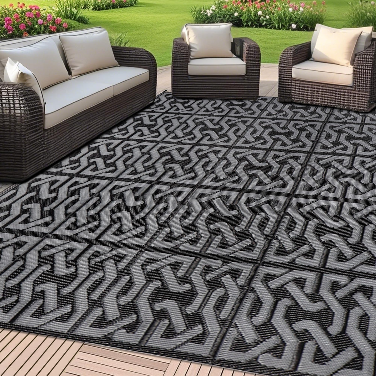 SAND MINE reversible mats on a sunlit patio, ideal for outdoor lounging