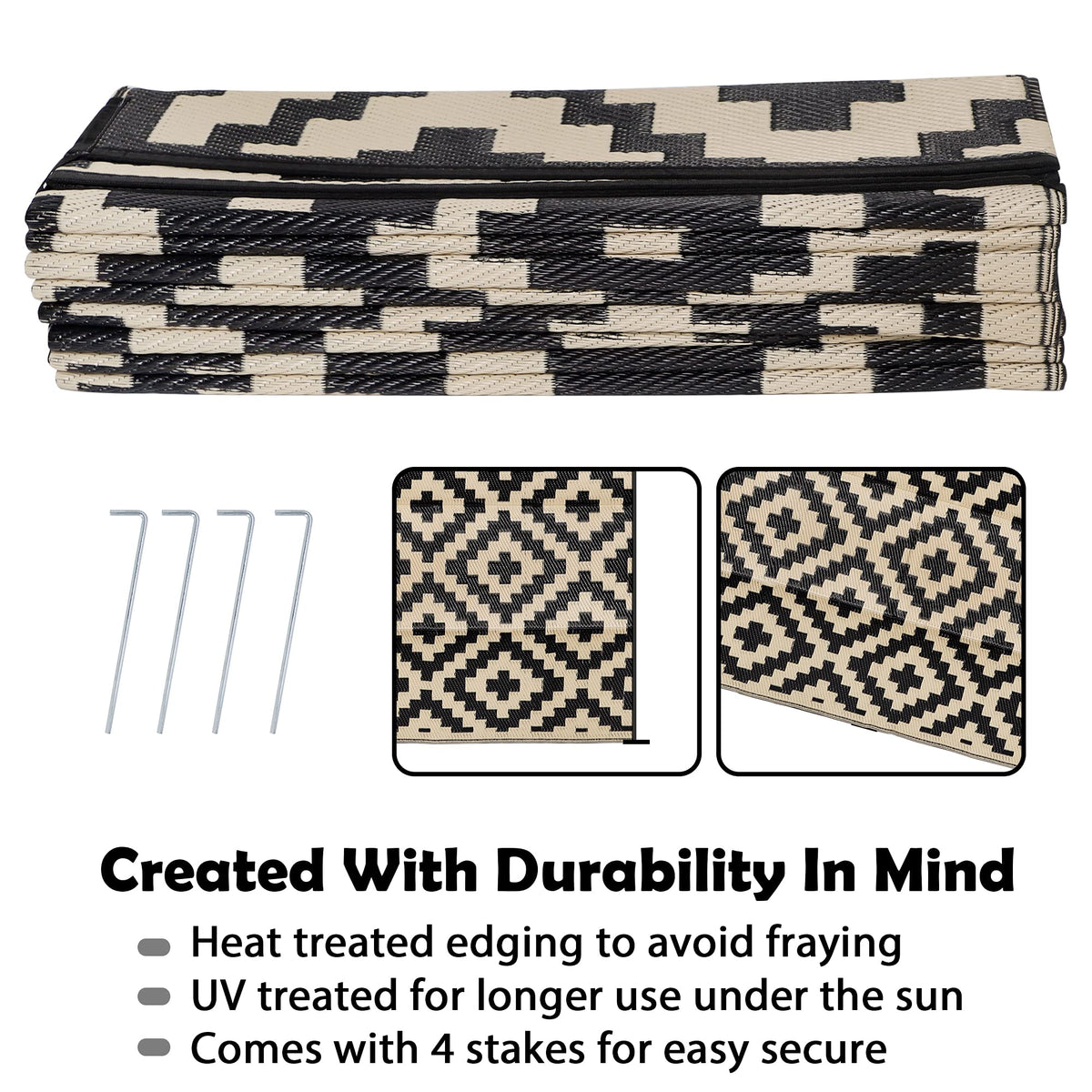 SAND MINE reversible outdoor rug on grass showing two color sides