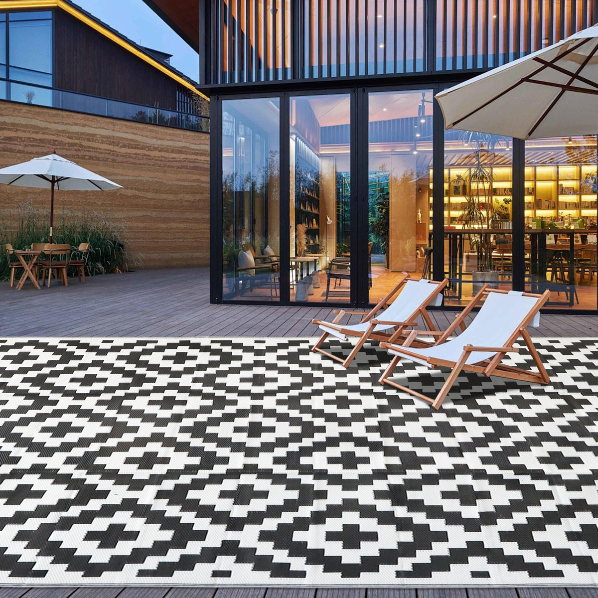 SAND MINE 9x18 outdoor rug with black-white lattice for patio elegance.