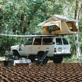 SAND MINE UV-stabilized outdoor rug resists fading under sun exposure.