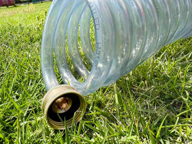 SANFU EVA recoil hose in transparent gray shows water flow clearly.