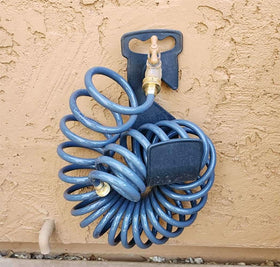 Sanfu PU Recoil Hose on porch for quick outdoor cleaning tasks.
