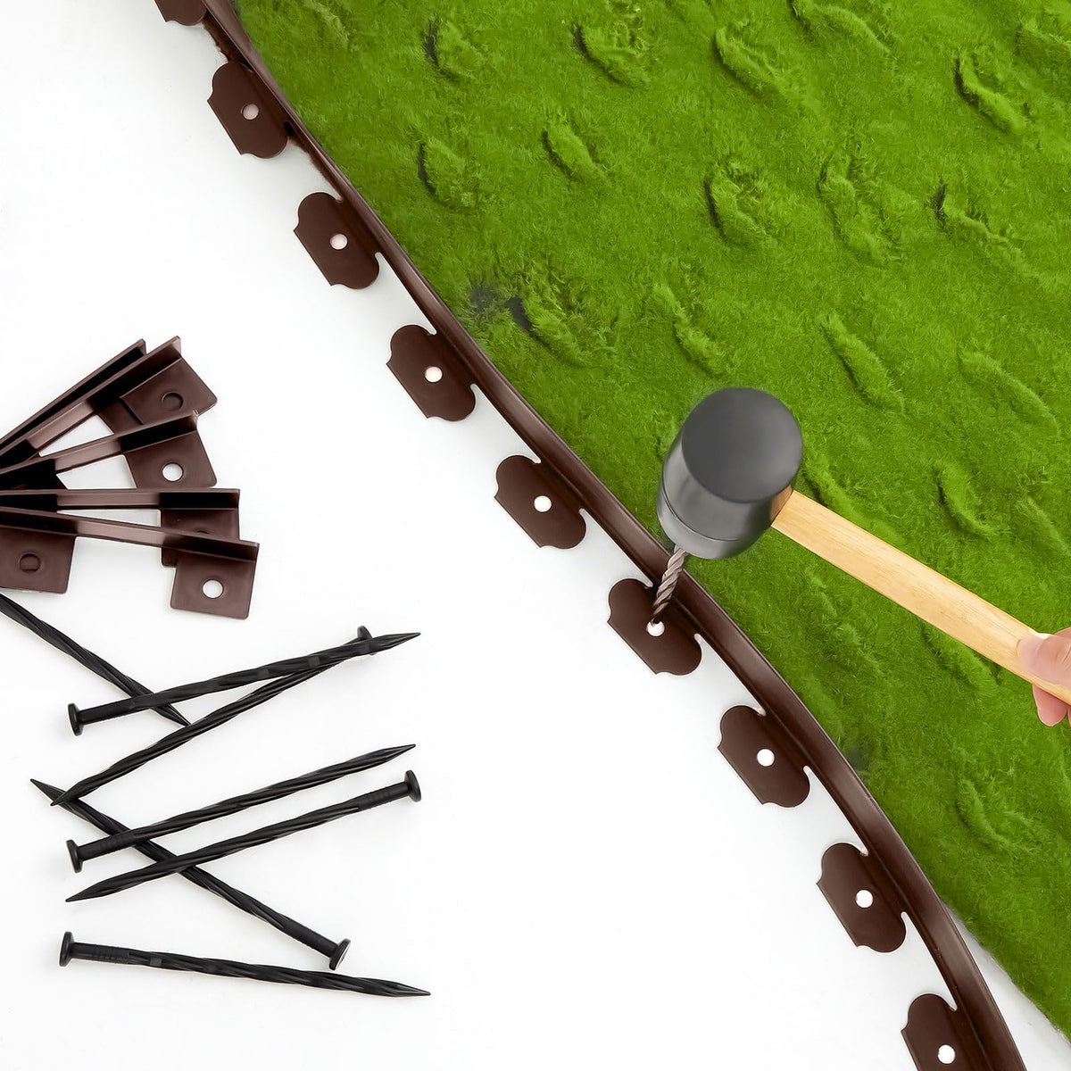 Sasylvia flexible edging material bending to curved garden shapes.