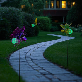SATHGA hanging spring bee stake adds motion and whimsy to pots.