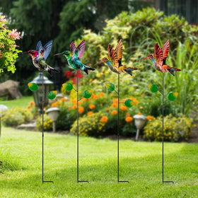 SATHGA decorative stake creates a welcoming pathway accent.