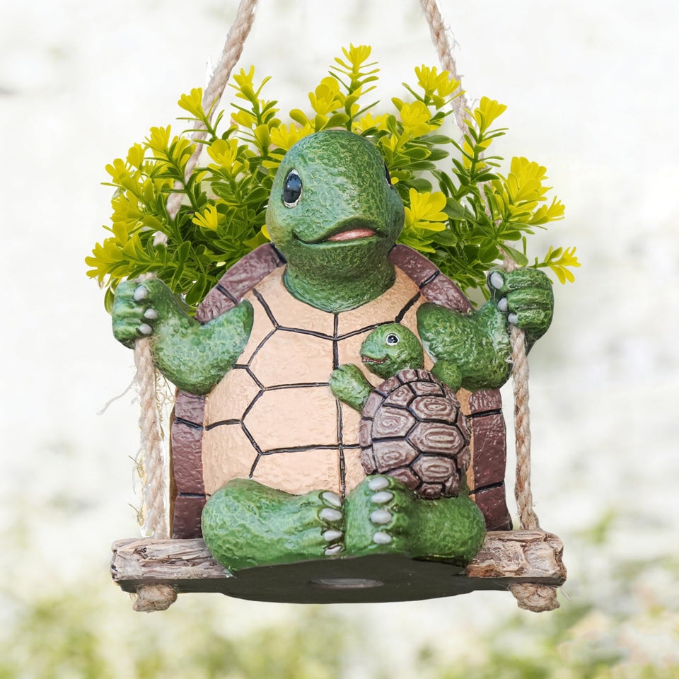 Saysmile Swing Turtle planter with mother and baby on a swing, adds cozy indoor charm.