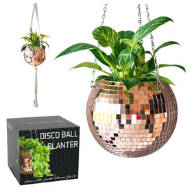 SCANDINORDICA disco ball planter close-up with rose-gold mirrors reflecting warm light