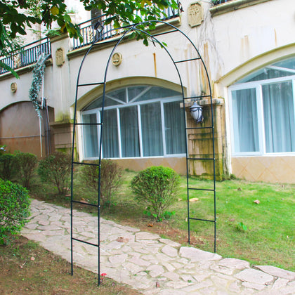 SCENDOR Green Iron Pergola Arch ready for easy assembly in a garden setting.