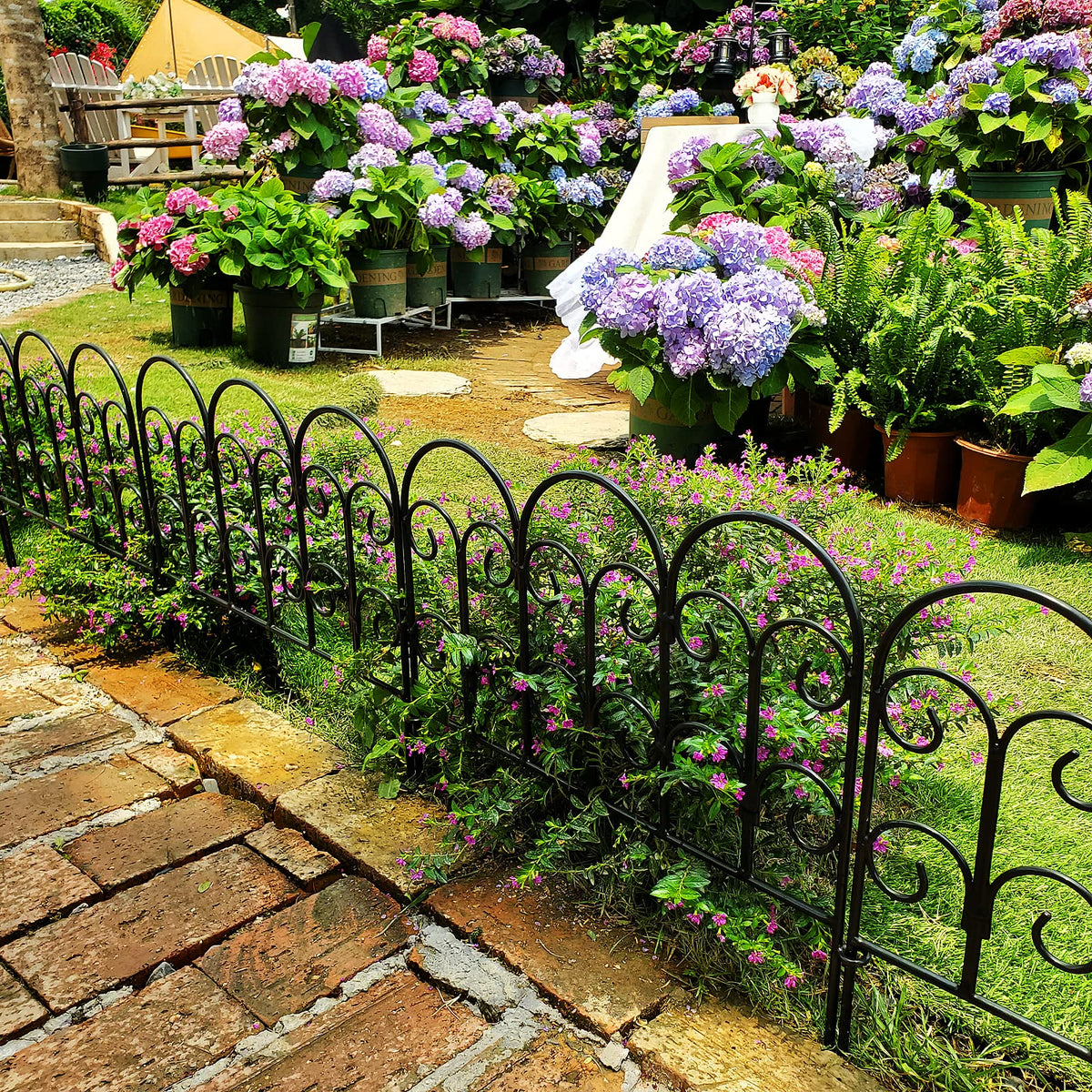 SCENDOR weatherproof wrought-iron fence complements outdoor decor.