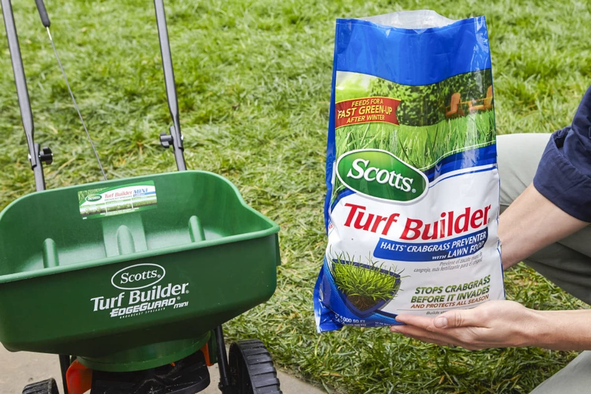 Scotts Turf Builder lawn food fertilizer bag applying nutrients for quick green-up