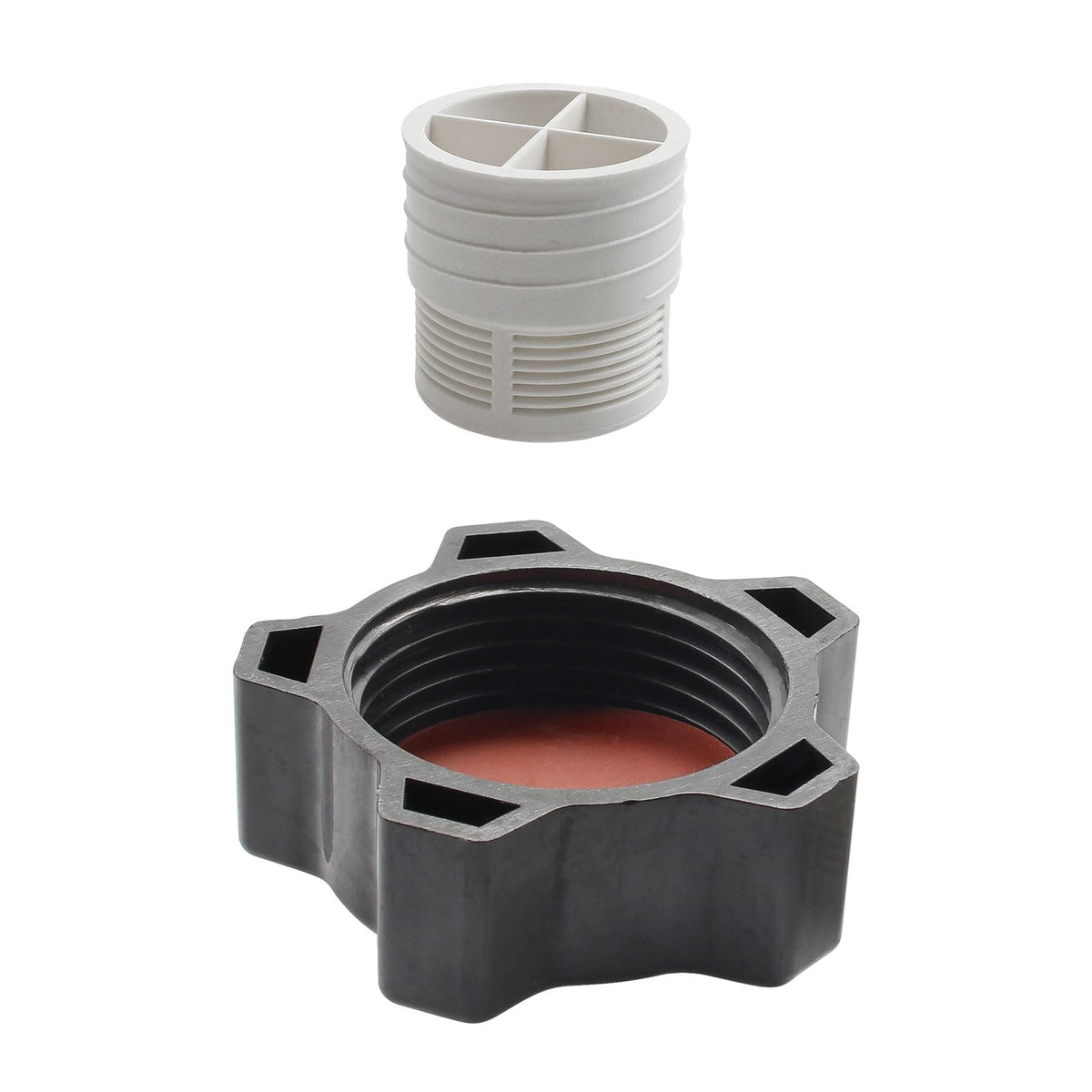 Screw Man drain cap gasket close-up showing debris prevention in the piping.