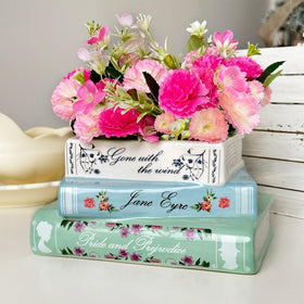 Scuyari small book-shaped planter front view, elevating bookshelf decor with a touch of greenery.
