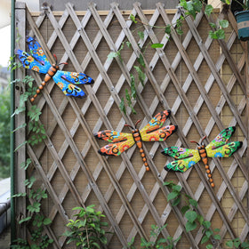 Scwhousi dragonfly wall art enhances living spaces with whimsical color.