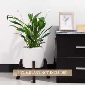 Seanmi bamboo plant stand side view highlighting sturdy base and balance