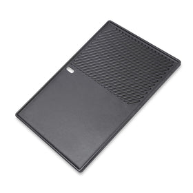 SearCook 17.5-inch cast iron grill griddle on a Weber setup for even heat