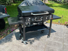 Compact storage footprint keeps the lid ready on the patio between cooks