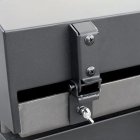 Back-hinged design shields the food from wind and weather during grilling