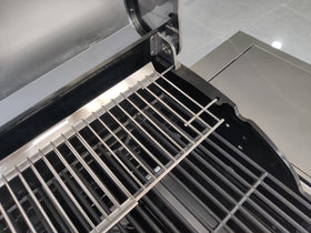 SearCook warming rack for Cuisinart grills expands available cooking area.