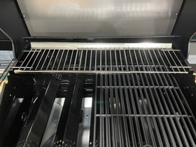 SearCook warming rack fits Monument grills adding extra warmth space.