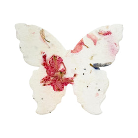 Seed Bloom large pink butterfly seed paper closeup with writable surface for notes.