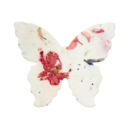 Seed Bloom large pink butterfly seed paper closeup with writable surface for notes.