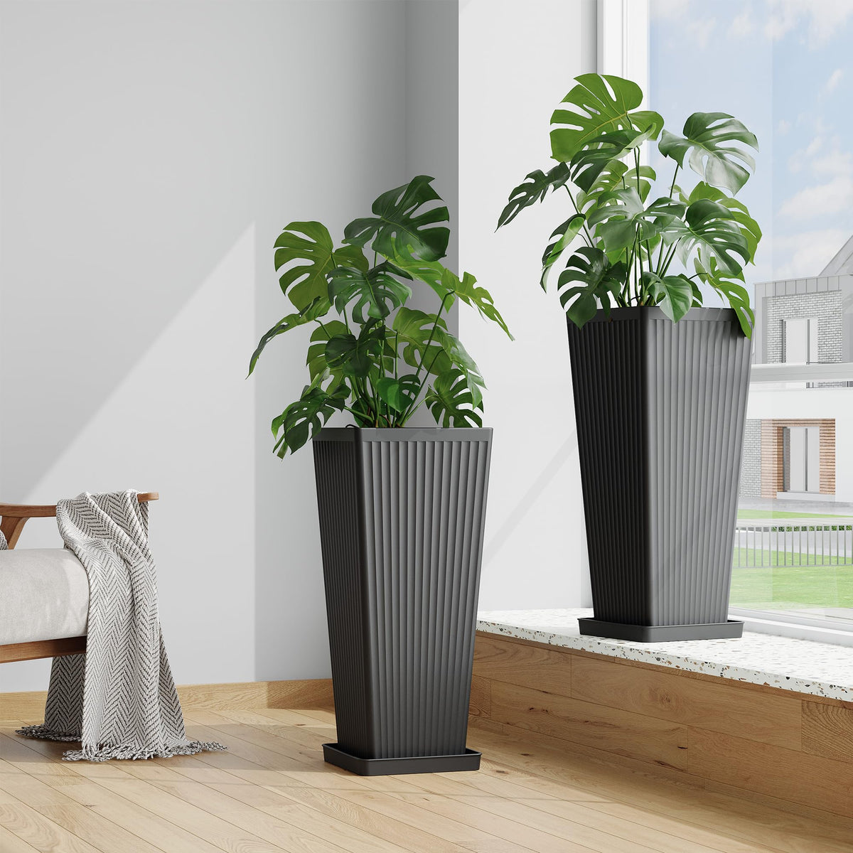 Seethmi tall planter provides generous rooting space for palms and ferns.