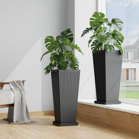 Seethmi tall planter provides generous rooting space for palms and ferns.