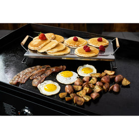Stainless steel surface is easy to clean after grilling sessions