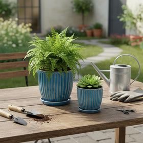 Seworlan blue glazed pot outdoors on a porch with plants